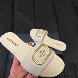 Coach Women's gold & cream slides